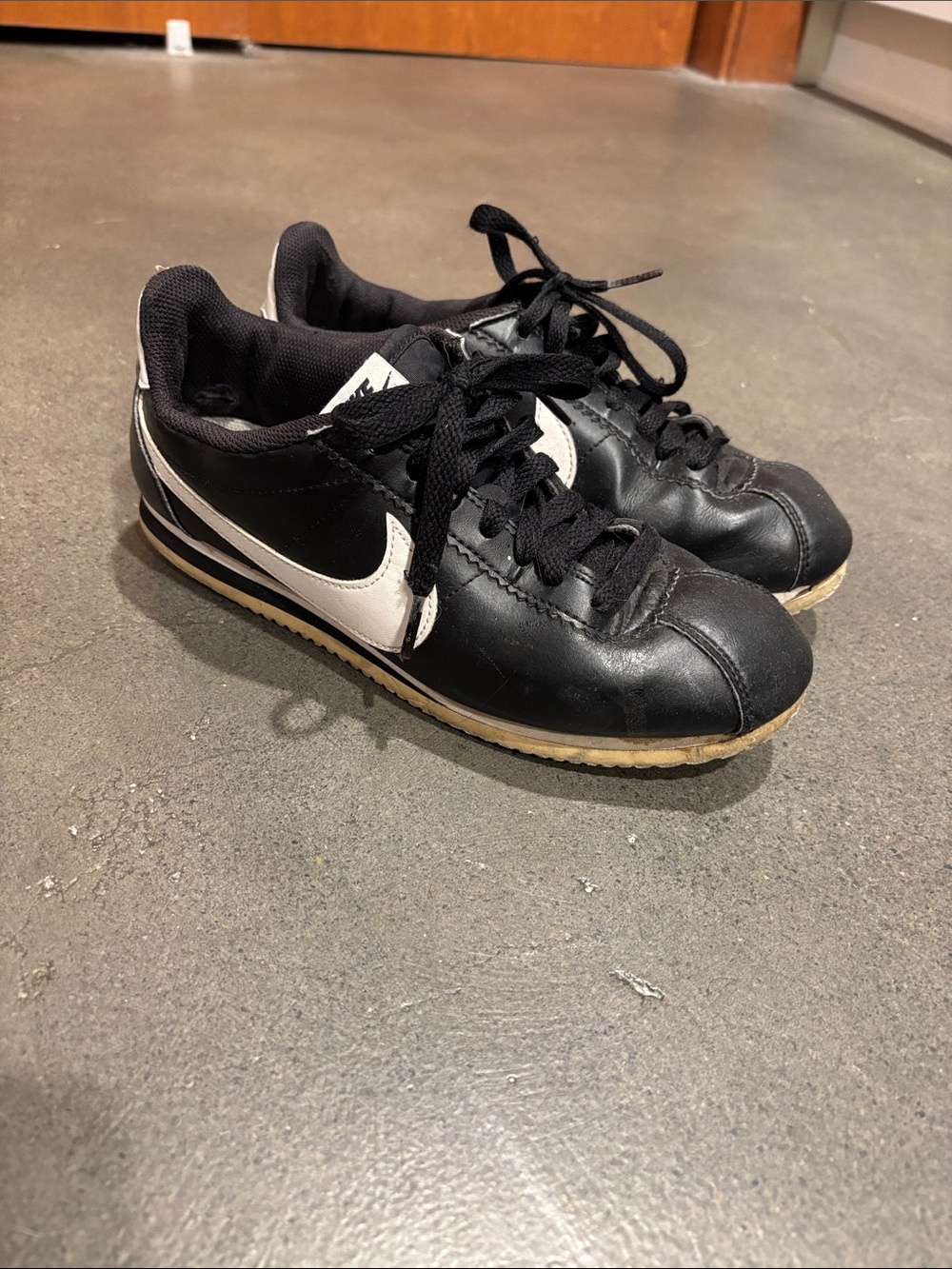 Nike Black and White Cortez Leather Sneakers